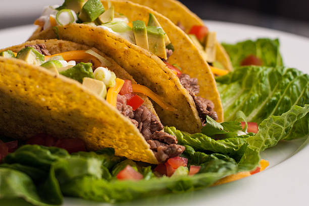 istock Trio of roast beef hard-shell tacos 452506593