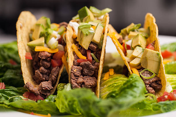 istock Trio of roast beef hard-shell tacos 452506615