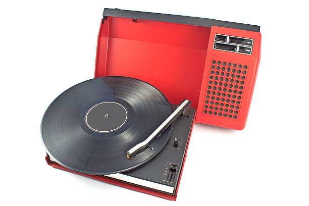 istock Vintage record player - portable turntable isolated on white 452510105