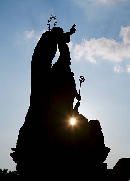 istock Prague - Silhouette of statue from Charles bridge 452515349