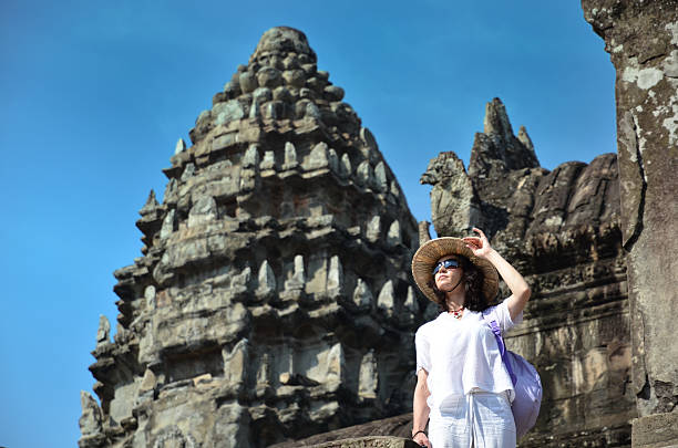 istock Girl in bayon temple cambodia 452516703