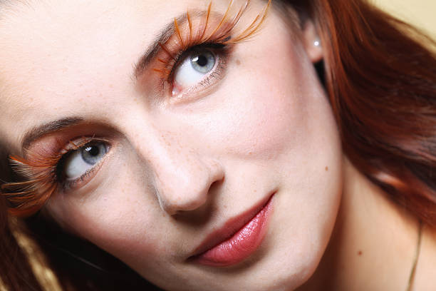istock Autumn woman stylish creative make up false eye lashes 452522219