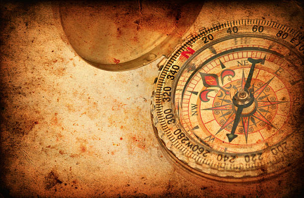 istock Navigation compass on Grunge old paper texture 452522339