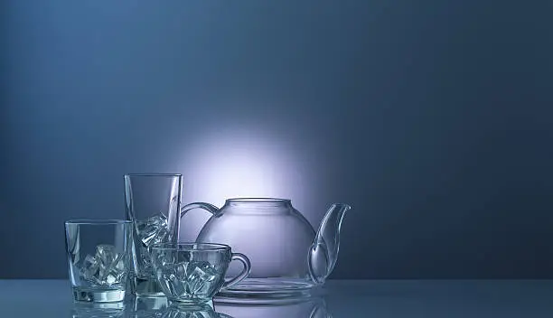 the glass teapot with cup