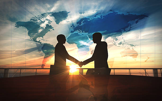 istock World business shake hand in office silhouettes 452532551