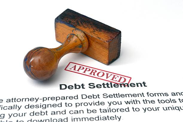 Debt settlement - approved stock photo