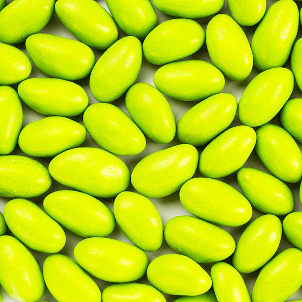 istock pile of green gumballs with nuts isolated 452535871