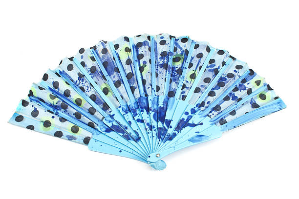 istock Blue polka dot hand fan isolated on white 452536019