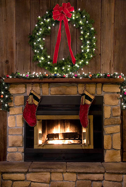 istock Christmas Fireplace Hearth with Wreath and Stockings 452542879