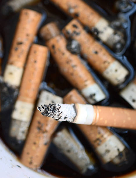 istock Ashtray Full of Cigarettes burnt butts 452545915