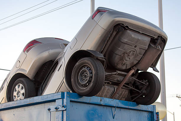 istock Junk cars in dumpster cash for clunkers 452549735