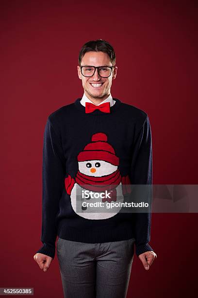 Portrait Of Funny Man Wearing Sweater With Snowman Stock Photo - Download Image Now - Ugly Sweater, Cardigan Sweater, Sweater