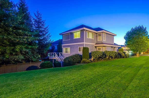 istock A beautiful house with a nice garden at dusk 452555651