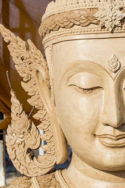 istock buddha face makes of wax 452564685