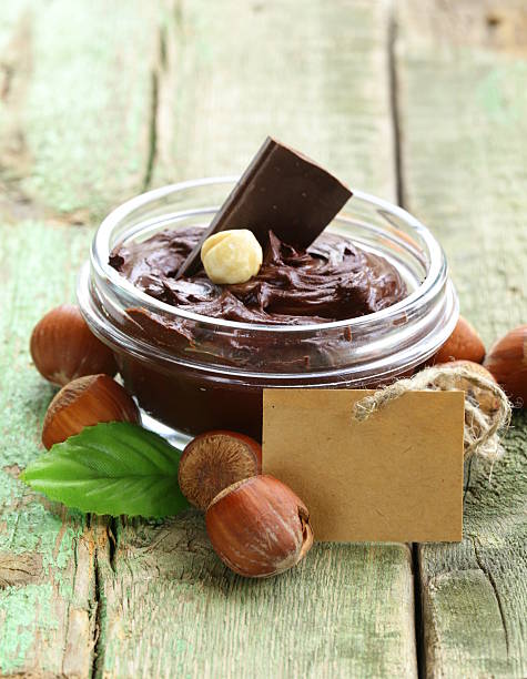 istock sweet chocolate hazelnut spread with whole nuts 452570359
