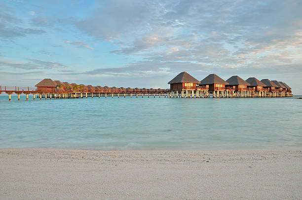 Overwater villas in sunrise