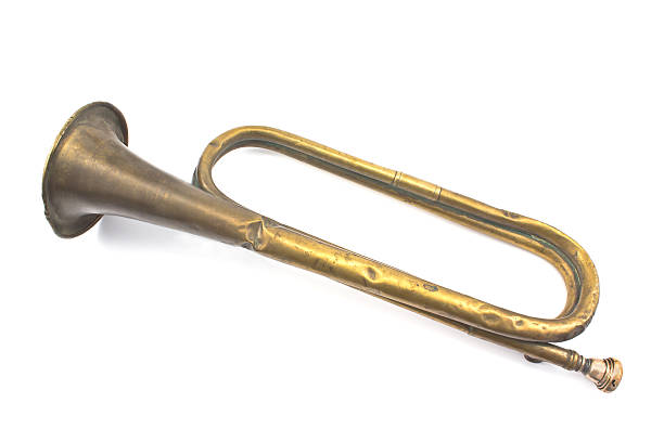 istock Old broken army trumpet isolated on white 452578933