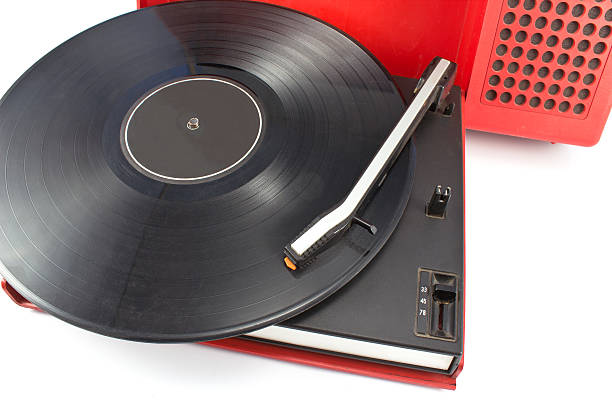 istock Vintage record player - portable turntable on white 452579257