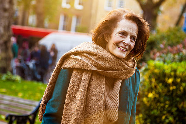 istock Senior woman in the park 452584793