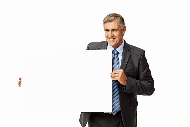 istock Smiling Businessman Holding Empty Placard 452586555