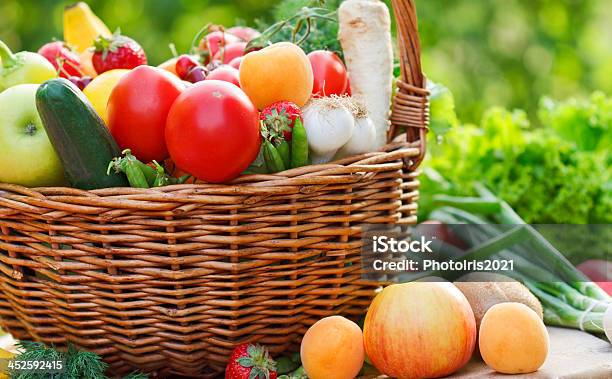 Organic Fruits And Vegetables In A Wicker Basket Stock Photo - Download Image Now - Agriculture, Apple - Fruit, Apricot