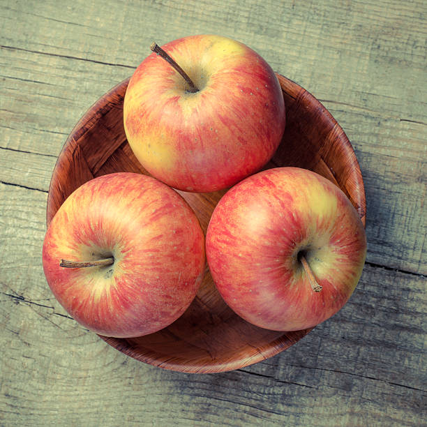 istock Sweet red apple in the bowl 452592419