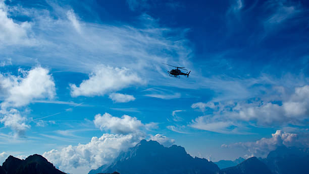 istock Helicopter flying on the Dolomiti 452595407