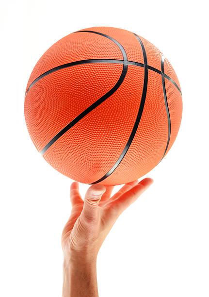 istock Hand and basketball isolated on white background 452599947