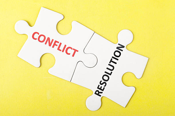Conflict and resolution words stock photo