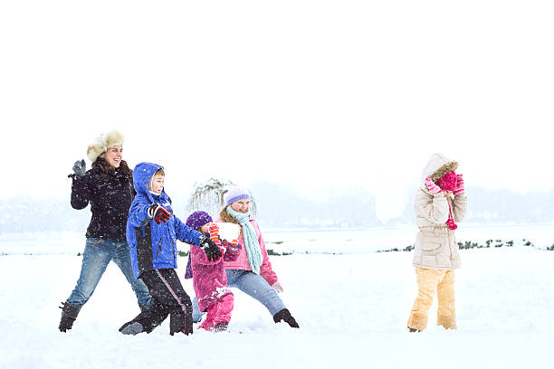 istock Happy family enjoying in winter 452623505