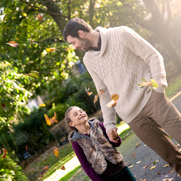 istock Father and daughter in the park 452626927