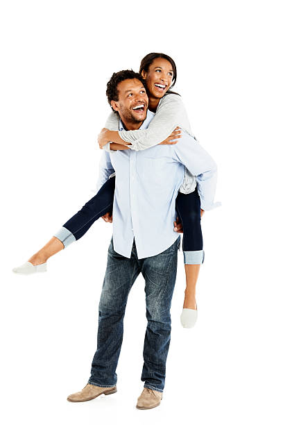 istock Mature man carrying his girlfriend looking away smiling 452630765