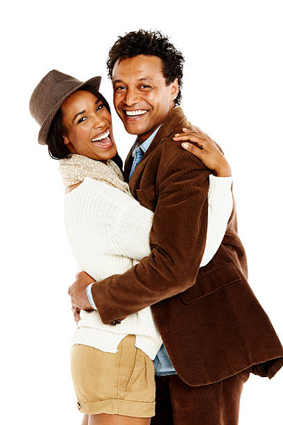 istock Cheerful couple embracing each other on white 452636043