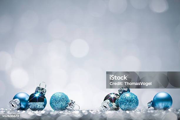 Blue Christmas Baubles Glitter Bokeh Season Holiday Background Stock Photo - Download Image Now