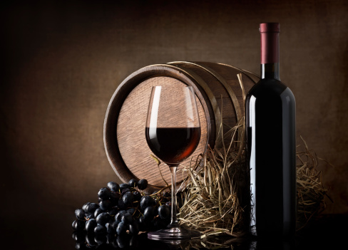 Wine with barrel and hay