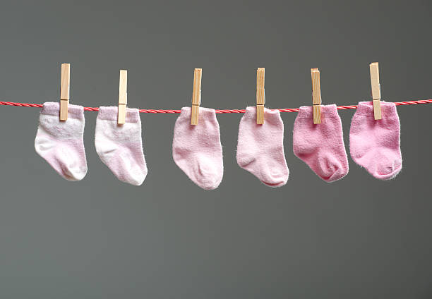 istock baby girl socks on the clothesline 452650921