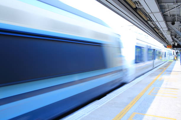 istock speed of train pass though the platform in hong kong 452651587