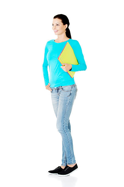istock Young casual student woman holding file. 452660277