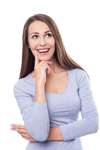 istock Beautiful woman looking up 452662419