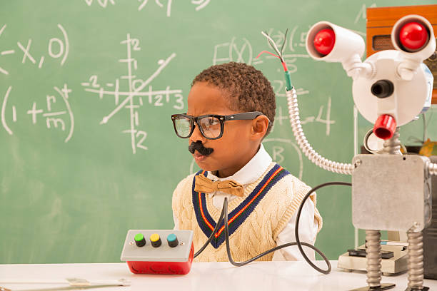 la educación: retro niño haciendo robot en science lab. - child back to school mustache african ethnicity fotografías e imágenes de stock