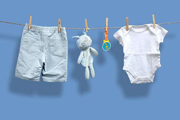 istock Baby boy clothes on the clothesline 452669365