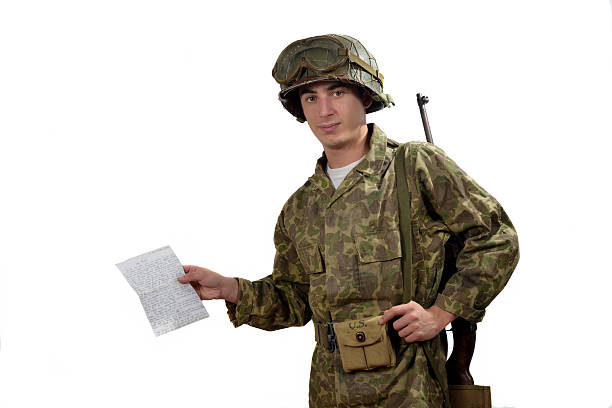 istock young American soldier  shows a photograph 452673035