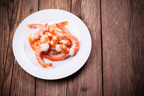 tiger shrimps tiger shrimps on white plate black tiger shrimp stock pictures, royalty-free photos & images