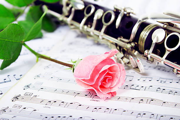 Clarinet On Sheet Music Stock Photo - Download Image Now - Clarinet, Chamber Music, Rose - Flower - iStock Clarinet On Sheet Music Stock Photo - Download Image Now - Clarinet, Chamber Music, Rose - Flower - iStock