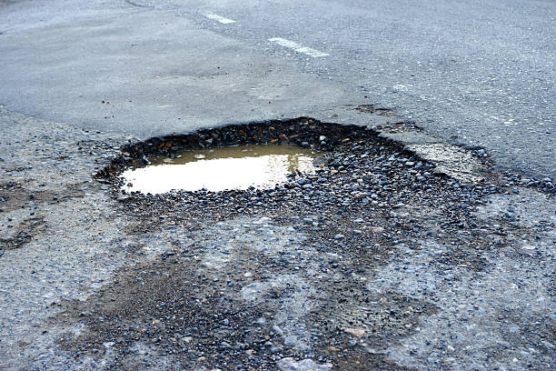 istock The road is being destroyed by landslide 452682625