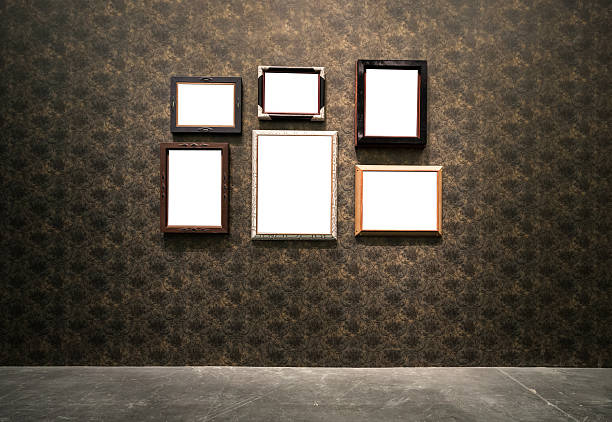 Ornate gold frame at grunge wallpaper