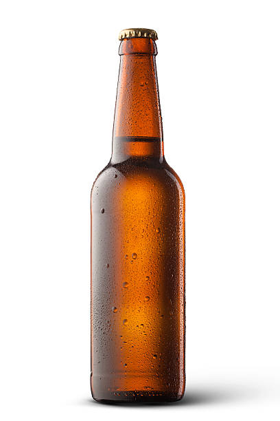 Beer bottle with water drops isolated on white stock photo