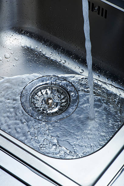 istock Water and droplets in sink 452685939