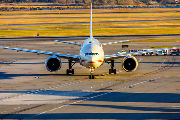 istock Passenger airplane line up on the runway 452686087