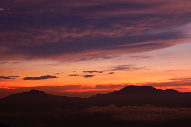 istock Sunrise over village in the mist after rain. 452687821